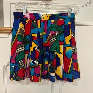 Vintage 1990s Tail Colorful Pleated Tennis Shirt. Size 10